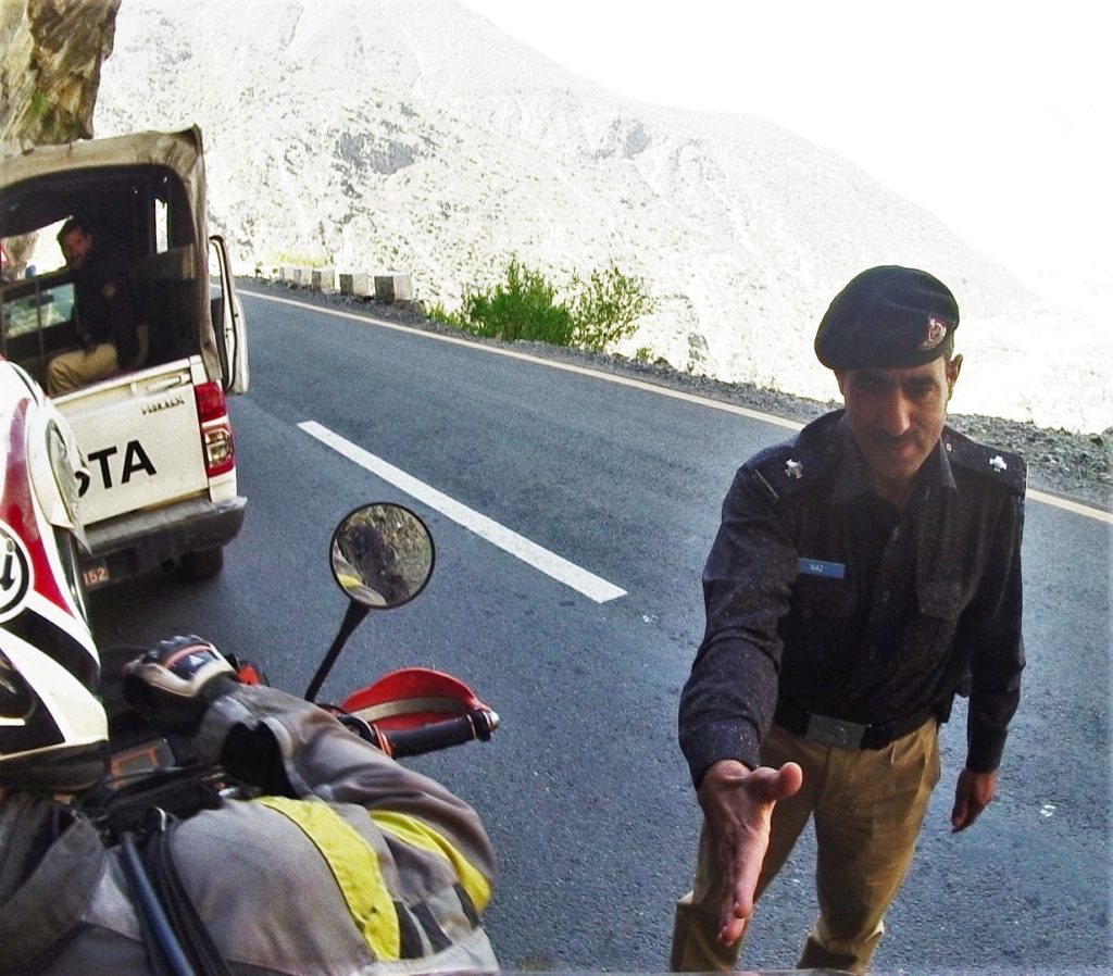 police escort welcomes us to Pakistan
